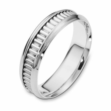 Item # 110991WE - 18 kt white gold, hand made comfort fit Wedding Band 6.0 mm wide. The ring has a hand made pattern in the center. The ring has a polished finish. Different finishes may be selected. 