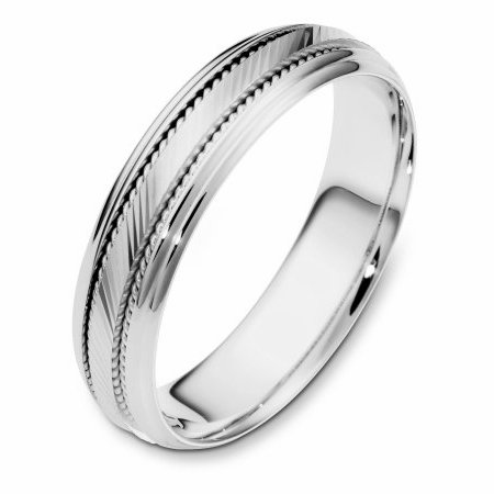 Item # 111631W - 14 kt white gold, hand made, wedding band 5.5 mm wide. The center of the ring has a design with milgrain on each side of the design. The whole ring is polished. Different finishes may be selected or specified.