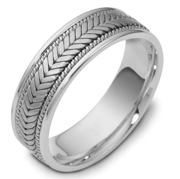 Item # 114301WE - 18 kt white gold, hand made comfort fit Wedding Band 7.0 mm wide. The ring has a handmade braid in the center with one hand crafted rope on each side of the the braid. The center is matte and the outer edges are polished. Different finishes may be selected or specified.