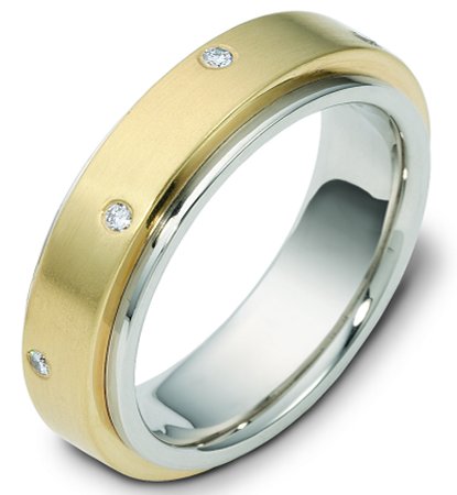 Item # 117681 - 14 K gold center rotating, 9.0 mm wide diamond spinning wedding band. Diamond total weight is 0.40 ct in size six. Diamonds are graded as VS in clarity H in color. The center of the ring is spinning and is a matte finish. The outer edges are polished. Different finishes may be selected or specified. 