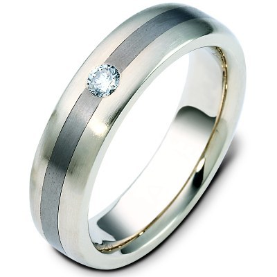 Item # 117781TG - 14 kt white gold and titanium, comfort fit, 6.0 mm wide, diamond wedding band. Diamond weighs 0.17 ct and is graded as VS in clarity G-H in color. The ring is a brush finish. Different finishes may be selected or specified.