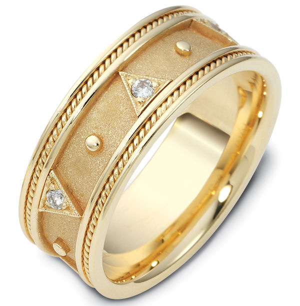 Item # 119011 - 14 kt Gold, 8.5 mm wide, 0.15 ct diamond ring. There is one hand crafted rope on each side of the band. The center of the band is a coarse and heavy sandblast finish. The rest of the band is polished. Different finishes may be selected or specified.