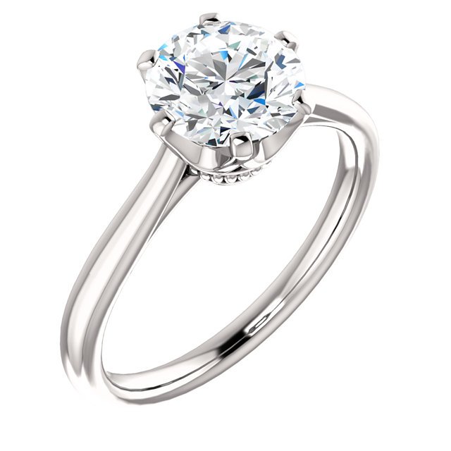 Item # 127682WE - One 18K white gold solitaire diamond engagement ring. The ring holds 1.0ct round brilliant ideal cut diamond certified by GIA as SI1 in Clarity H in Color.