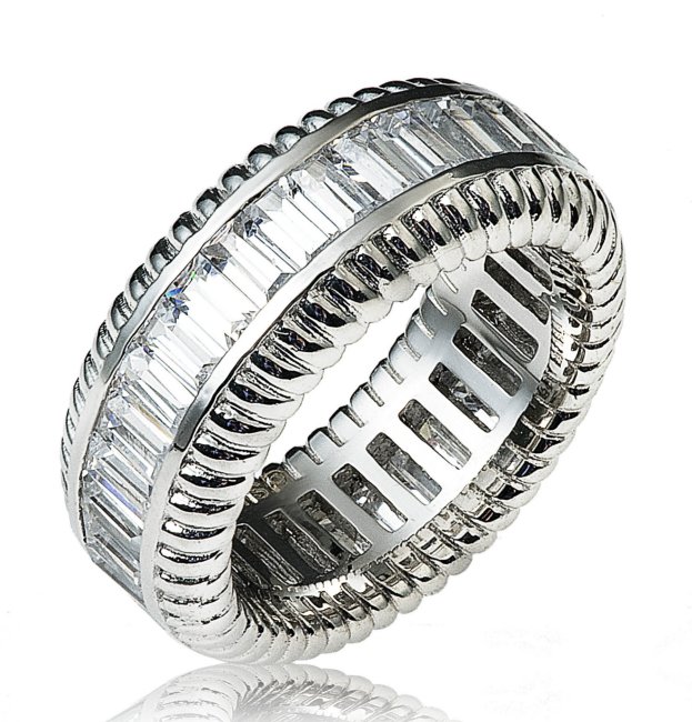 Item # 13836WE - 18K white gold diamond eternity ring. The ring in size 7.0  holds 34 baguette cut diamonds. The diamonds together weigh 5.1ct and the diamonds are graded as VS in clarity G-H in color.