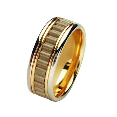 Item # 211431 - 14Kt Two-tone wedding band. The ring is about 8.0 mm wide and comfort fit. There is a unique design in the center which is a coarse sandblast finish. The outer edges are polished. Different finishes may be selected or specified.