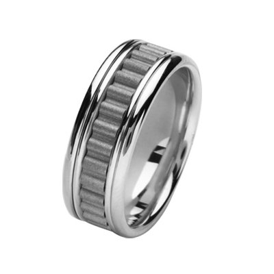 Item # 211431PP - Platinum wedding band. The ring is about 8.0 mm wide and comfort fit. There is a unique design in the center which is a coarse sandblast finish. The outer edges are polished. Different finishes may be selected or specified.