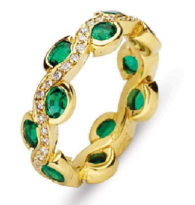 Item # 211963 - 14K gold diamond emeral eternity band. The ring holds 11 oval shape matching emeralds with total weight approximately 2.75ct and 1.0 ct total weight round brilliant cut diamonds. The emerald all are very fine quality and matching in colors. Diamonds are graded as VS in clarity G-H in color.
