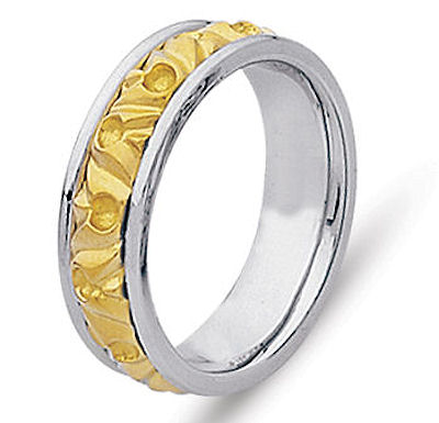 Item # 21303PE - Hand crafted, platinum and 18 kt yellow gold comfort fit band. The ring is beautifully designed around old motifs. It is approximately 8.0 mm wide. The center is a matte finish and the outer edges are polished. Different finishes may be selected or specified. 