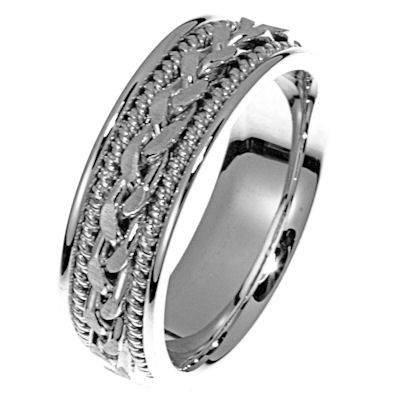 Item # 21397W - Hand crafted, 14kt white gold comfort fit band. There is a hand made braid in the center. Two channels of 14 kt white gold twisted wires completes the ring. The whole ring is polished. Different finishes may be selected or specified.