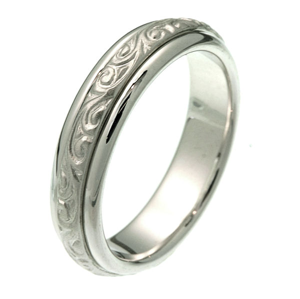 Item # 214041W - 14 kt white gold 5.5 mm wide comfort fit wedding band. The ring has beautiful hand carved motifs in the center that is a matte finish and the edges are polished. It is 5.5 mm wide and comfort fit. Different finishes may be selected or specified. 