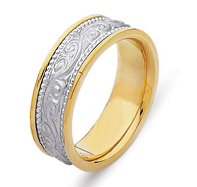 Item # 21497PE - Hand crafted, platinum and 18 kt yellow gold comfort fit band. The ring has beautiful hand crafted engraving in the center and is a matte finish. The outer edges are polished. Different finishes may be selected or specified. 