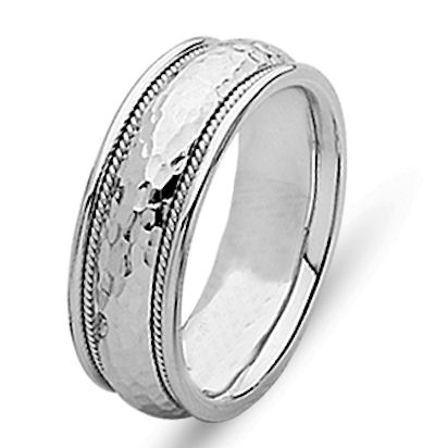Item # 21516WE - 18 kt white gold hand crafted, 6.0 mm wide, comfort fit wedding band. The ring is high dome with the center hammered finish and two twisted ropes made in 18 kt white gold. The ring is polished. Different finishes may be selected or specified. 