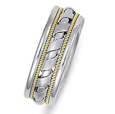 Item # 21526 - Hand crafted, 14 kt two-tone gold comfort fit band. The ropes are 14kt yellow gold and the rest is white gold. The ring is 7.0 mm wide and comfort fit. The center is matte and the rest is polished. Different finishes may be selected or specified. 