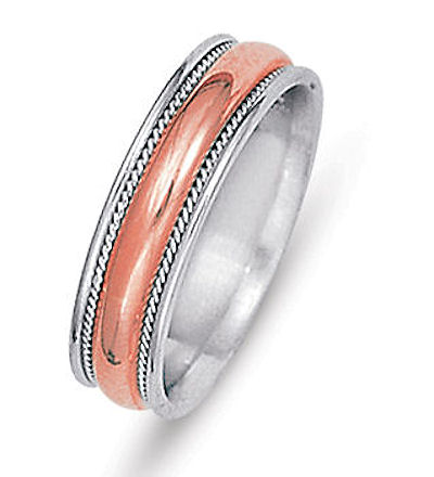 Item # 21528R - Hand crafted, 14 kt rose and white gold comfort fit band. The ring is 6.0 mm wide. There are two hand made ropes in the center of the ring. The finish on the ring is polished. Different finishes may be selected or specified.