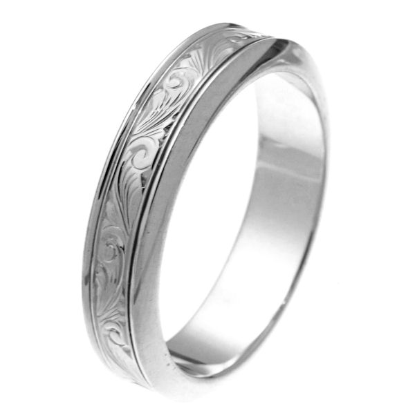 Item # 218001WE - 18 kt white gold 5.5 mm wide hand carved comfort fit wedding band. The ring has hand carving in the center with a polished finish. It is 5.5 mm wide and comfort fit. Different finishes may be selected or specified. 