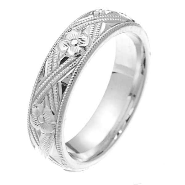Item # 2228971PP - Platinum hand carved comfort fit 5.0 mm wide wedding band. The white gold is hand carved with milgrains and flowers. It is 5.0 mm wide and a polished finish. Different finishes may be selected or specified.
