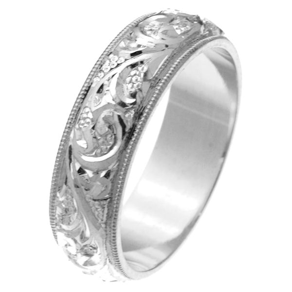 Item # 2616576WE - 18 kt white gold hand carved comfort fit 6.0 mm wedding band. The white gold is hand carved with beautiful motifs and the milgrain edge is white gold. It is 6.0 mm wide and comfort fit. The finish is polished. Different finishes may be selected or specified. 