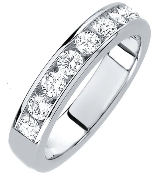 Item # 3001011WE - 18K white gold, diamond band. The 4.0 mm wide band set in channel holds 9 diamonds with total weight of approximately 1.0 ct. The diamonds are graded as VS in clarity G-H in color. The finish is polished. Different finishes may be selected or specified. 