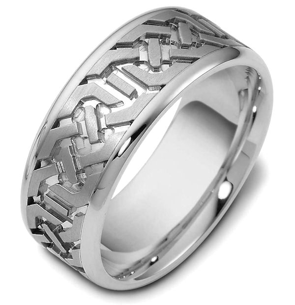 Item # 47542WE - 18kt White gold contemporary carved, comfort fit, 8.5mm wide wedding band. The ring has a beautiful carved pattern around the whole band with a matte finish in the center and polish finish on the edges. It is 8.5mm wide and comfort fit. 