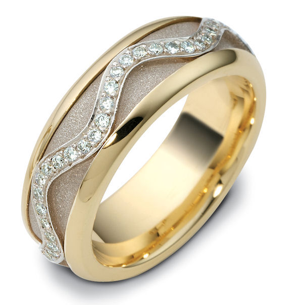 Item # 47769NA - 14kt Two-tone gold diamond, comfort fit, spinning, 7.0mm wide wedding band. The ring has approximately 0.30 ct tw diamonds, VS1-2 in clarity and G-H in color. There are about 60 round brilliant cut diamonds all around the band. The quantity and total weight of diamonds may vary depending on the size of the ring. The center of the ring spins. It is 7.0mm wide and comfort fit. The center of the band has a sandblast finish. 