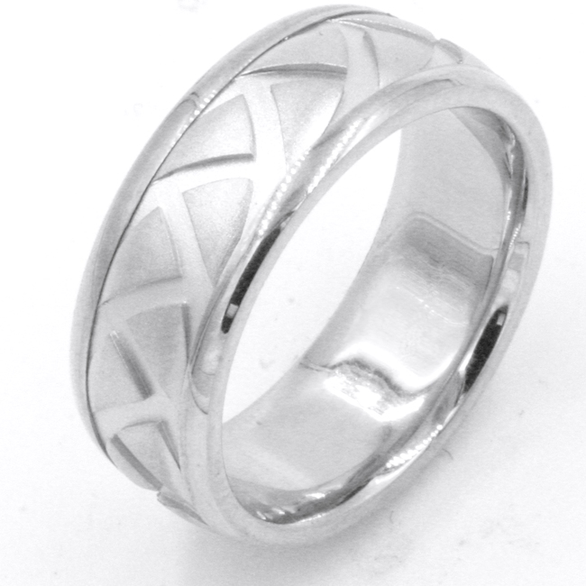 Item # 47897WE - 18kt White gold, carved, comfort fit, 8.0mm wide wedding band. The ring has a carved tire pattern throughout the ring. It is 8.0mm wide and comfort fit. 