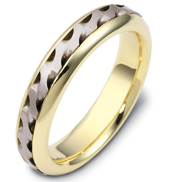 Item # 47922 - 14kt Two-tone gold handcrafted, comfort fit, 5.0mm wide wedding band. There is a beautiful carved and crafted patter in the center of the band that has a matte finish. The edges are polished finish. Different finishes may be selected or specified. 