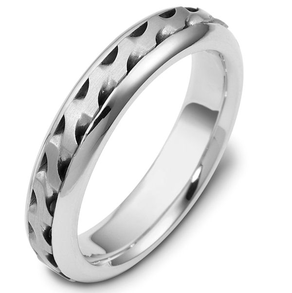 Item # 47922W - 14kt White gold handcrafted, comfort fit, 5.0mm wide wedding band. There is a beautiful carved and crafted patter in the center of the band that has a matte finish. The edges are polished finish. Different finishes may be selected or specified. 
