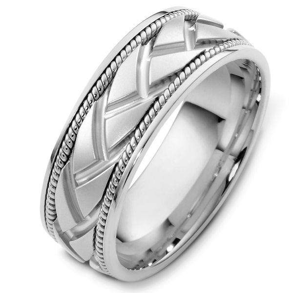Item # 48237WE - 18kt White gold handcrafted, carved, comfort fit, 8.0mm wide wedding band. The center of the ring is carved and one hand crafted rope on each side of the carving. It is 8.0mm wide and comfort fit.