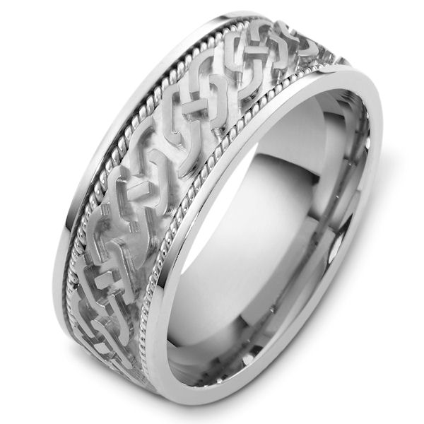 Item # 48263WE - 18kt White gold carved, comfort fit, 8.0mm wide wedding band. The center of the ring is carved with a matte finish. There is one hand crafted rope on each side of the carving. It is 8.0mm wide and comfort fit. 