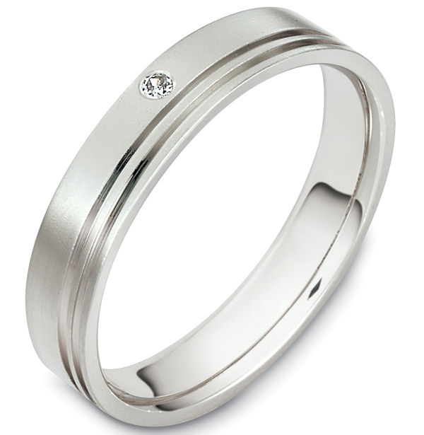 Item # 48606WE - 18kt White gold diamond, comfort fit, 4.5mm wide wedding band. The ring holds one round brilliant cut diamond that is 0.02 ct, VS1-2 in clarity and G-H in color. There are 2 carved lines around the whole band. It is 4.5mm wide, comfort fit, and has a matte finish. Different finishes may be selected. 