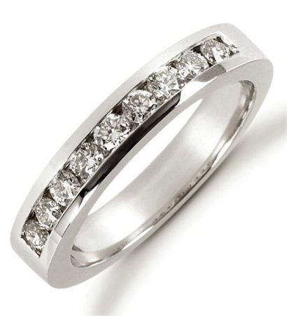 Item # 521239WE - 18Kt White gold anniversary band. The ring holds 9 round brilliant cut diamonds each measures 2.4 mm in size. The diamonds are approximately 0.45 ct tw, VS1-2 in clarity, very clean and G-H in color, near colorless to colorless. The diamonds are channel set. The band is about 3.5 mm wide. The finish is polished. Different finishes may be selected or specified. 