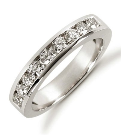 Item # 521249PD - Palladium anniversary band. The ring holds 9 round brilliant cut diamonds each measures 2.7 mm in size. The diamonds are approximately 0.63 ct tw, VS1-2 in clarity, very clean and G-H in color, near colorless to colorless. The diamonds are channel set. The band is about 3.5 mm wide. The finish is polished. Different finishes may be selected or specified.