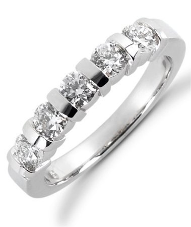 Item # 522985PP - Platinum anniversary band. The ring holds 5 round brilliant cut diamonds, each measures 3.4 mm. The diamonds are approximately 0.75 ct tw, VS1-2 in clarity, very clean and G-H in color.  The diamonds are set in single channels. The band is about 3.5 mm wide. The finish is polished. Different finishes may be selected. 