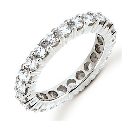 Item # 5310010W - 14Kt White gold eternity ring. The ring holds 34 round brilliant cut diamonds, each measures 1.5 mm. The diamonds are approximately 0.51 ct tw for size 6.0, VS1-2 in clarity, very clean and G-H in color, near colorless to colorless. The diamonds are set in prongs. The band is about 2.0 mm wide. The finish is polished. Different finishes may be selected. 