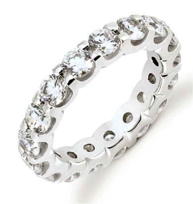 Item # 5316720PD - Palladium eternity ring. The ring holds 16 round brilliant cut diamonds, each measures 3.8 mm. The diamonds are approximately 3.20 ct tw, VS1-2 in clarity, very clean and G-H in color, near colorless to colorless. The diamonds are set in prongs. There may be more diamonds in large size rings. The band is about 4.5 mm wide. The finish is polished. Different finishes may be selected.
