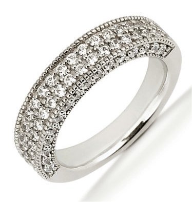 Item # 5410489PD - Palladium anniversary band.The ring holds 70 round brilliant cut diamonds, each measures 1.5 mm. The diamonds are approximately 1.05 ct tw, VS1-2 in clarity, very clean and G-H in color, near colorless to colorless. The diamonds are set with prongs and both in the center with two rows of diamonds and a single row of diamonds on the side of the band. The band is about 4.5 mm wide. The finish is polished. Different finishes may be selected.