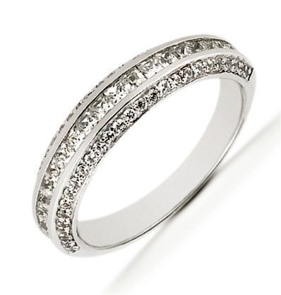 Item # 5416079W - 14Kt White gold anniversary band. The ring holds 21 princess cut diamonds that measure 1.5x1.5 mm and 54 round brilliant cut diamonds that measure 1.2 mm. The diamonds are approximately 0.95 ct tw, VS1-2 in clarity, very clean and G-H in color, near colorless to colorless. The princess cut diamonds are set in a channel and the round brilliant cut diamonds are set in prongs. There are diamonds in the center of the band and set on the side. The band is about 4.5 mm wide. The finish is polished. Different finishes may be selected.