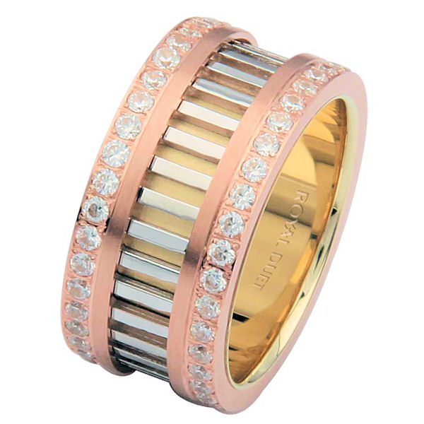 Item # 68719201DE - 18 kt tri-color, comfort fit, 10.0 mm wide, diamond eternity ring. The band combines white, yellow and rose gold in a unique design with diamond rows on each side of the band. The diamonds go around the whole ring. It has approximately 1.20 ct tw brilliant cut diamonds, that are VS1-2 in clarity and G-H in color. The diamond weight may vary depending on the size of the ring. 