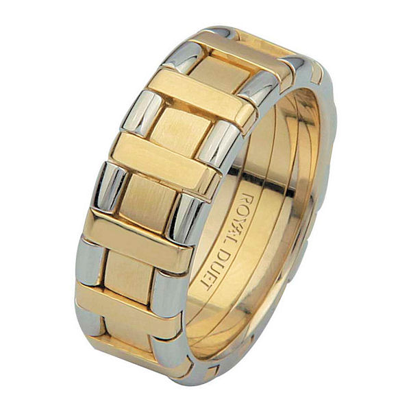 Item # 68735101 - 14 kt two-tone gold, comfort fit, 7.1 mm wide, wedding ring. The band has white and yellow gold combined to create a beautiful design. There is a mixture of brushed and polished finish. Other finishes may be selected or specified. 