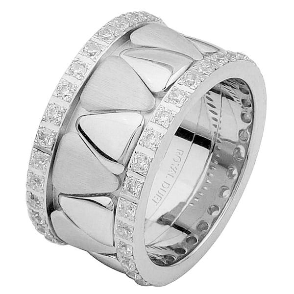 Item # 68746010DW - 14 kt white gold, comfort fit, 11.1 mm wide, diamond eternity ring. The band is made of white gold with rounded triangles in the center. The diamonds go around the whole ring. It has approximately 1.05 ct tw round briliant cut diamonds, that are VS1-2 in clarity and G-H in color. Diamond total weight may vary slightly depending on the size of the ring. 