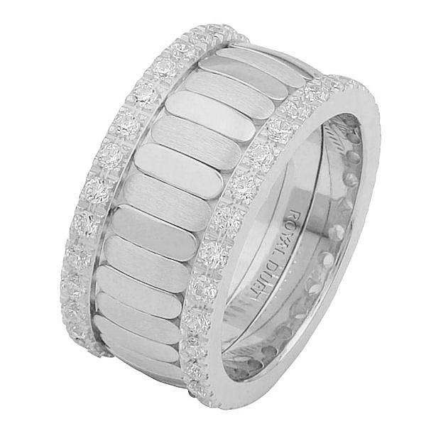 Item # 68747121DW - 14 kt white gold, comfort fit, 10.2 mm wide, diamond eternity ring. The band is made of white gold with diamonds accenting each side of the ring. It has approximately 1.05 ct tw round brilliant cut diamonds, that are VS1-2 in clarity and G-H in color. Diamond total weight may vary depending on the size of the ring. 