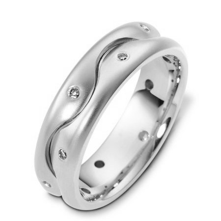 Item # A124821WE - 18K white gold, 6.5 mm wide, comfort fit, diamond wedding band. The band holds 10 round brilliant cut diamond with total weight of 0.15 ct. The diamonds are graded as VS1-2 in clarity G-H in color. The finish is matte. Different finishes may be selected or specified.