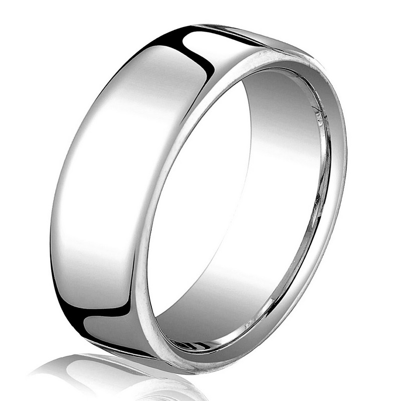 Item # B25843WE - 18 kt white gold, plain, comfort fit, 6.5 mm wide wedding band. The ring has a slight flat surface and comfort fit on the inside. It has a polished finish. Other finishes may be selected or specified. 