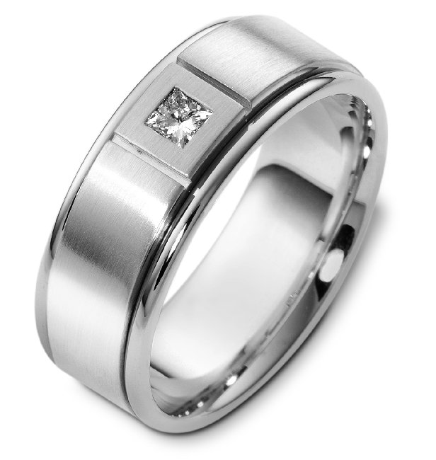 Item # C123751WE - 18K White gold, 8.0 mm wide, comfort fit diamond wedding band. The wedding band has one princess cut diamond that weighs 0.16 ct and is graded as VS in clarity G-H in color. The finish in the center is matte and the outer edges are polished. Different finishes may be selected or specified. 