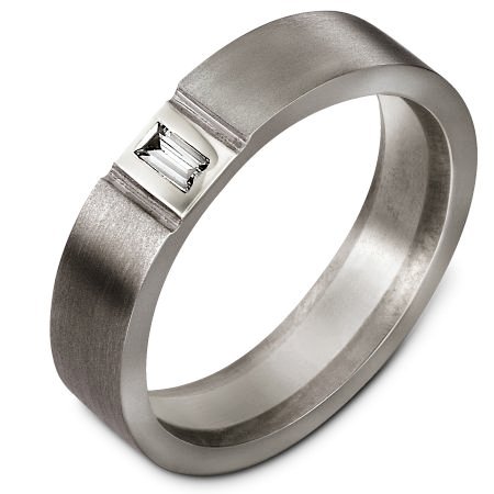 Item # C127541TE - Titanium and 18 kt white gold diamond, 5.5 mm wide, comfort fit wedding band. It holds one straight baguette cut 0.15 ct diamond, VS1 in clarity and GH in color. The ring has a matte finish. Different finishes may be selected. 