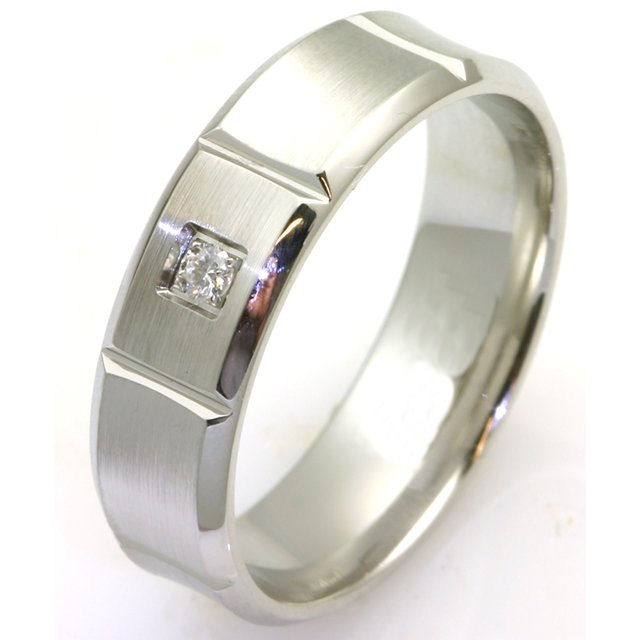 Item # C7828C - Cobalt chrome diamond, 7.0 mm wide wedding ring. The ring holds one round brilliant cut diamond that is 0.05 carats. The diamonds are VS1-2 in clarity and G-H in color. The ring is brushed in the center and polished on the beveled edges. Other finishes may be selected. 