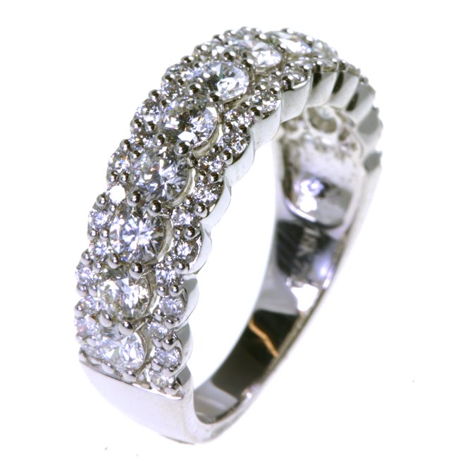 Item # DS8809PP - One platinum diamond anniversary band holds 57 round brilliant cut diamonds with total weigh of 1.47ct. The diamonds are graded as VS in clarity G-H in color.