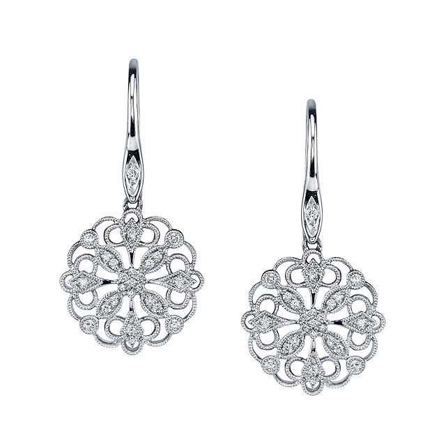 Item # E32589W - 14kt white gold, circular, vintage, diamond dangle earrings. There are about 48 round brilliant cut diamonds set in the earrings. The diamonds are about 0.23 ct tw, VS1-2 in clarity and G-H in color. 