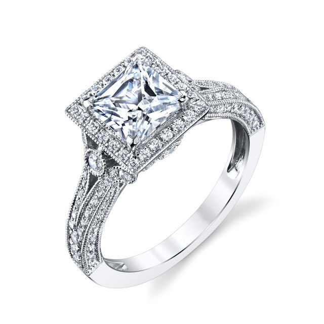 Item # E32754WE - 18kt white gold, princess cut, diamond halo, vintage engagement ring. There are about 86 round brilliant cut diamonds set around the center stone and in the ring. The diamonds are about 0.61 ct tw, VS1-2 in clarity and G-H in color. Center stone is sold separately and in different sizes. Pictured is a 1.0 carat princess cut diamond. 
