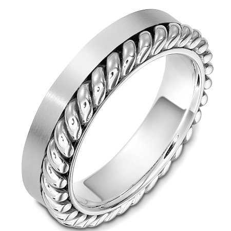 Item # G133321WE - 18 Kt White gold wedding band, 5.5 mm wide comfort fit wedding band. There is one hand made rope on one side of the ring. The finish on the rope is polished and the rest of the band is matte. Other finishes may be selected or specified.